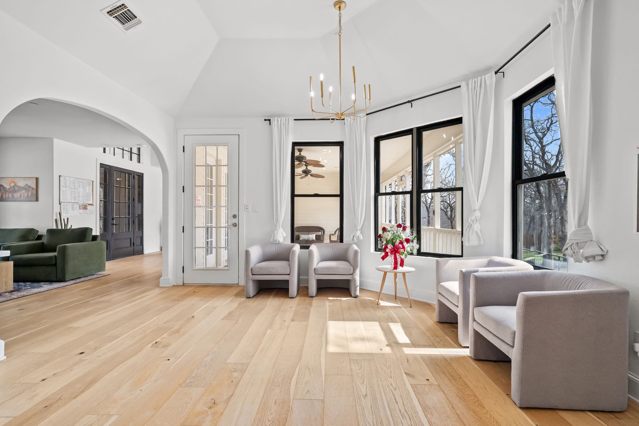 The vaulted-ceiling lounge with armchairs at Fort Worth Wellness Center